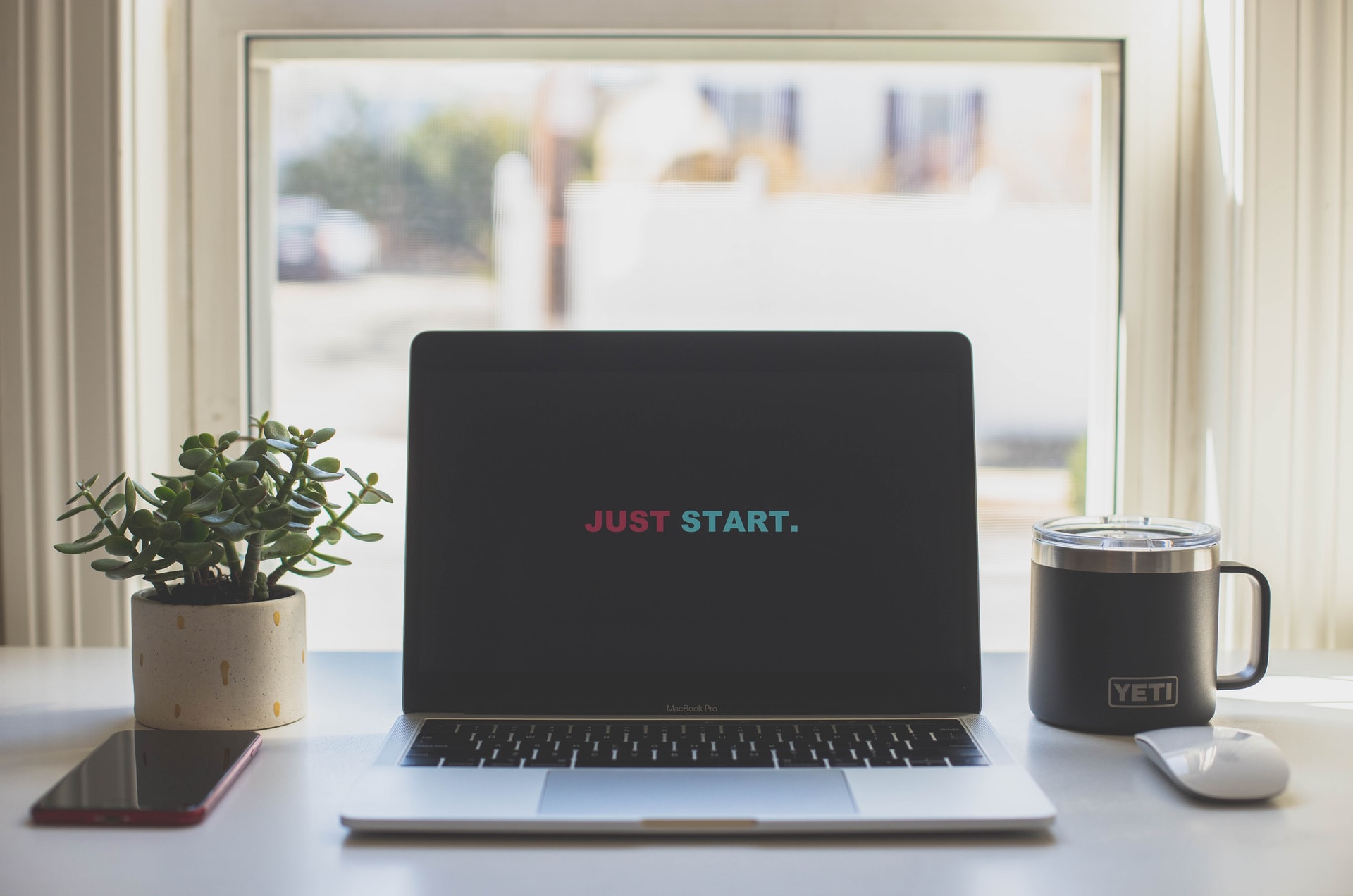 computer screen with the words "start now"